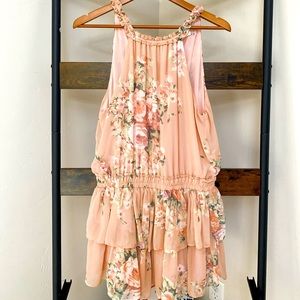 Pink floral romper with tie on upper back